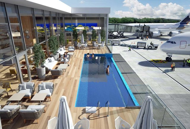 Swimming Pool Right Next To the Runway